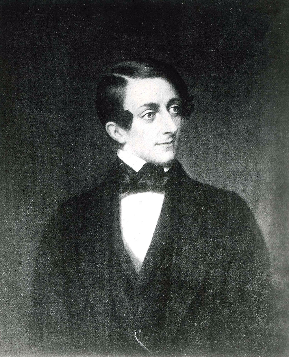 Portrait eines jungen Mannes mit gescheiteltem Haar